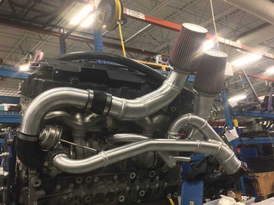 Machined and fabricated components installed in a finished assembly
