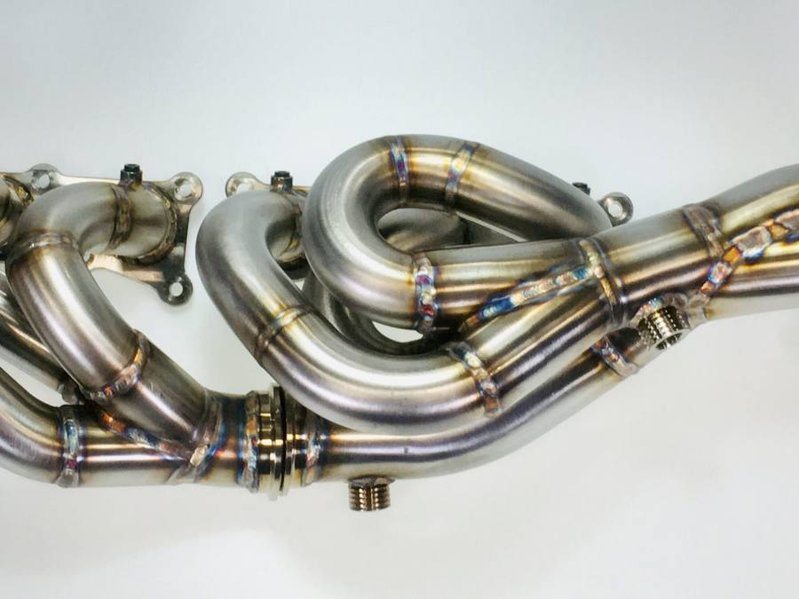 Stainless steel tubular header assemblies